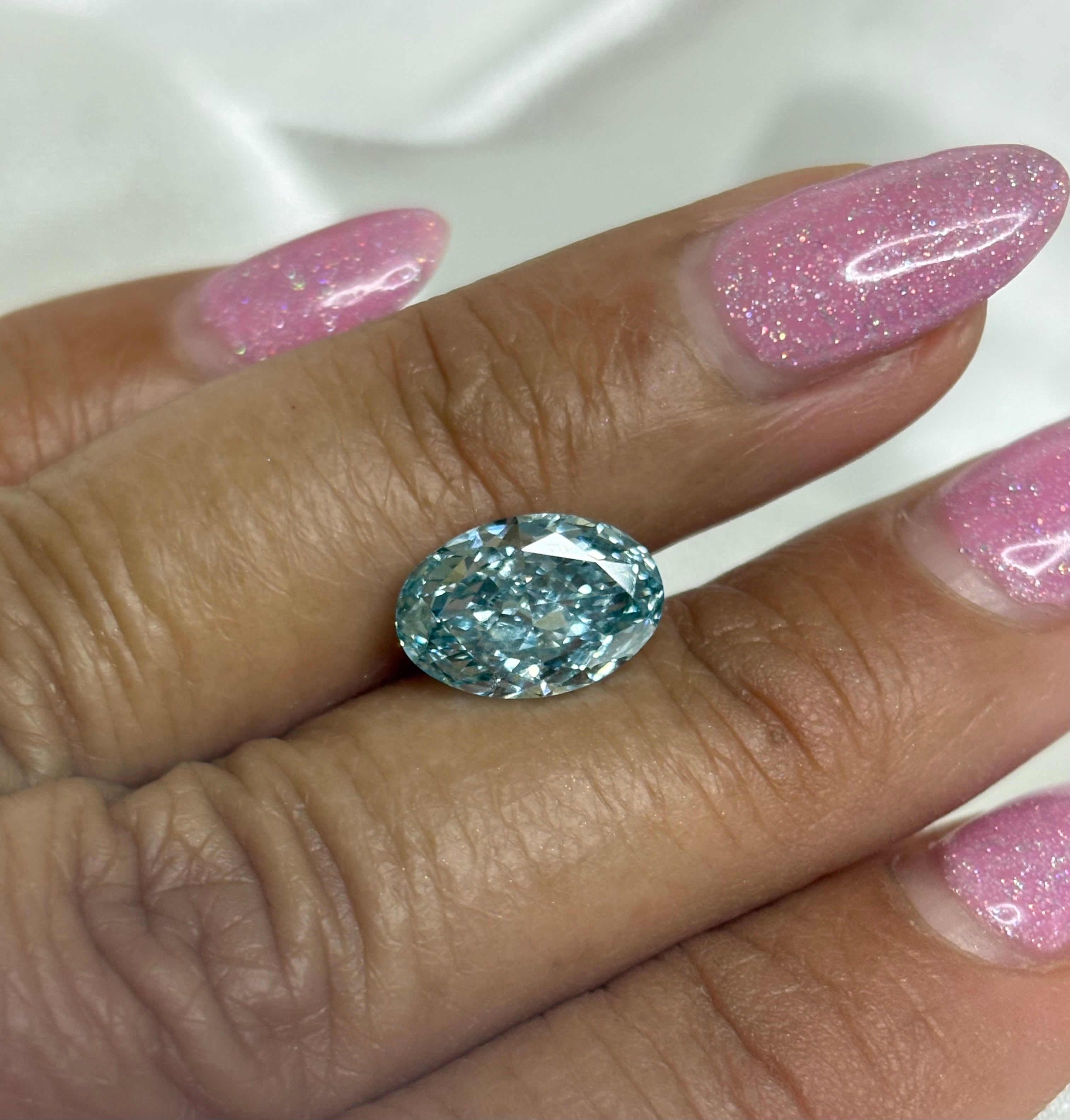 3.26 CT Oval Fancy Intense Greenish Blue Lab-Grown Diamond – VS1 | IGI Certified